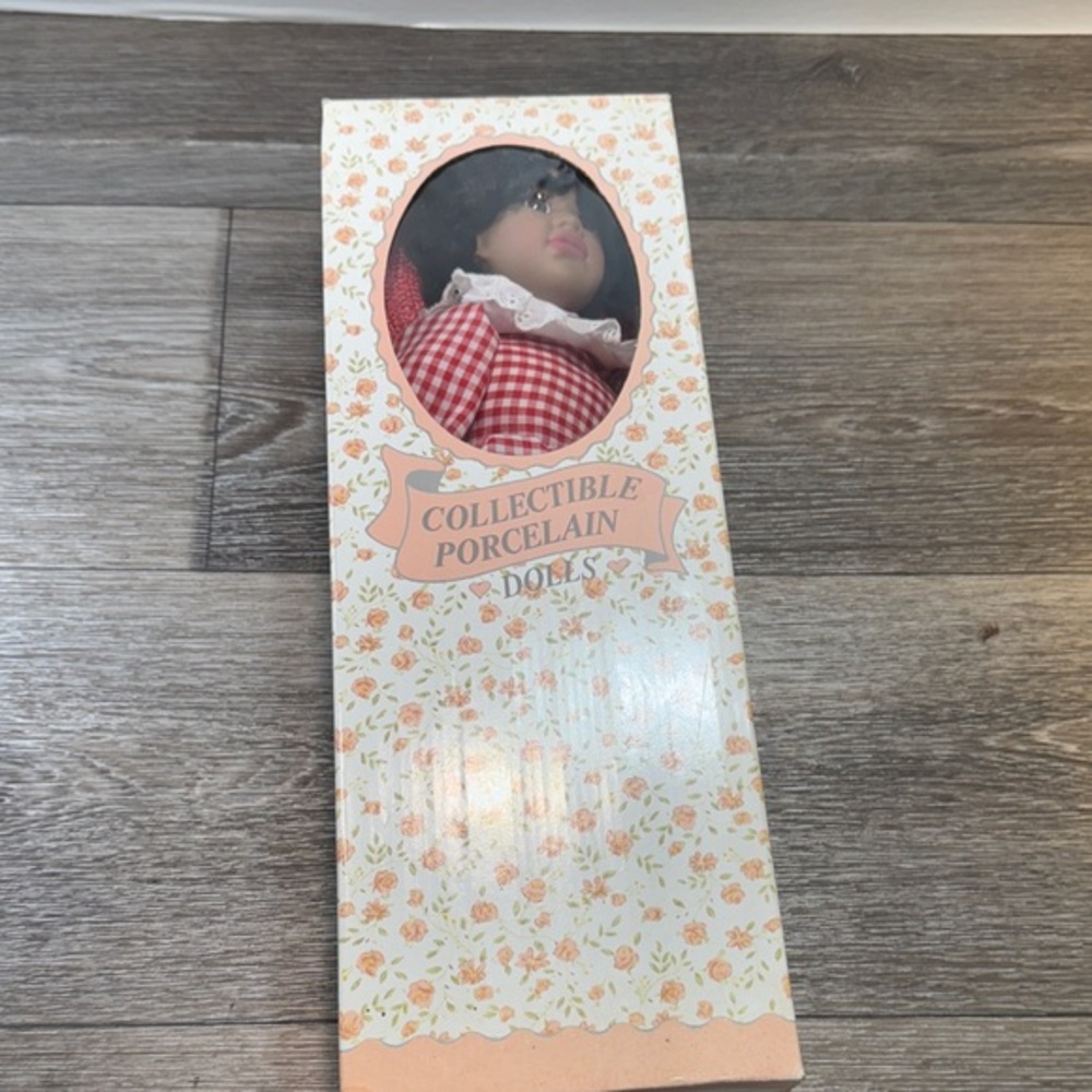 Collectible Porcelain Doll in Red and White Dress